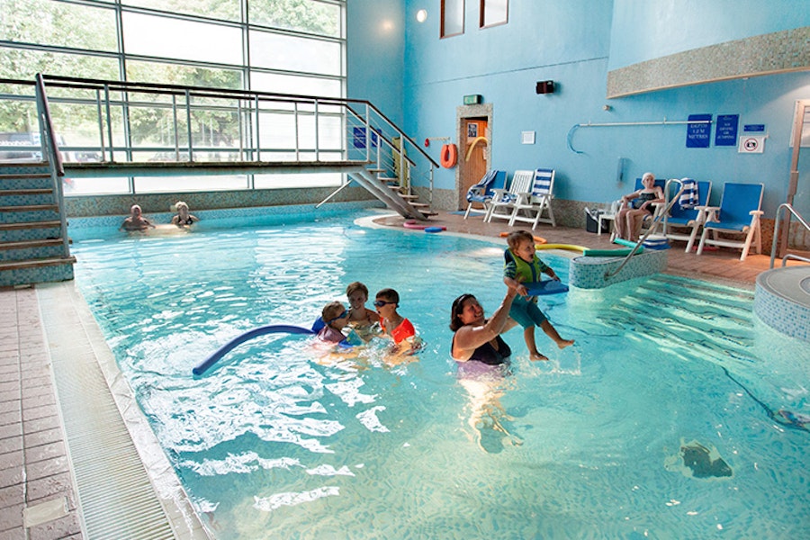 Family in swimming pool near Paultons Park