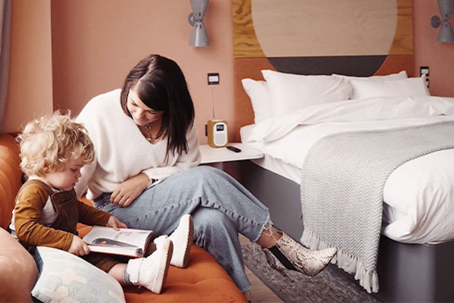 Woman and toddler in a hotel room near Peppa Pig World
