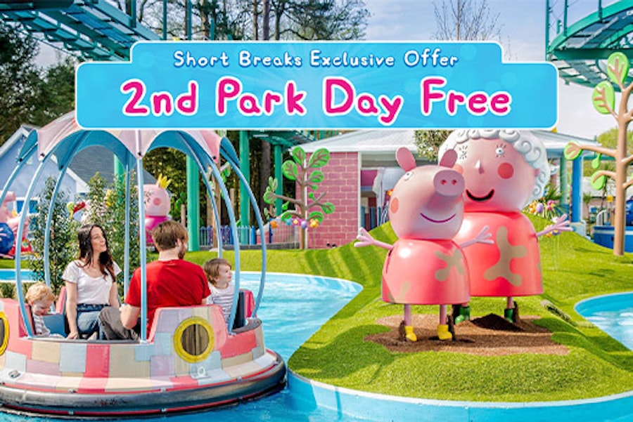 Promotional offer for '2nd Park Day Free' showing a family on a boat ride with two animated pig characters in a vibrant theme park setting.