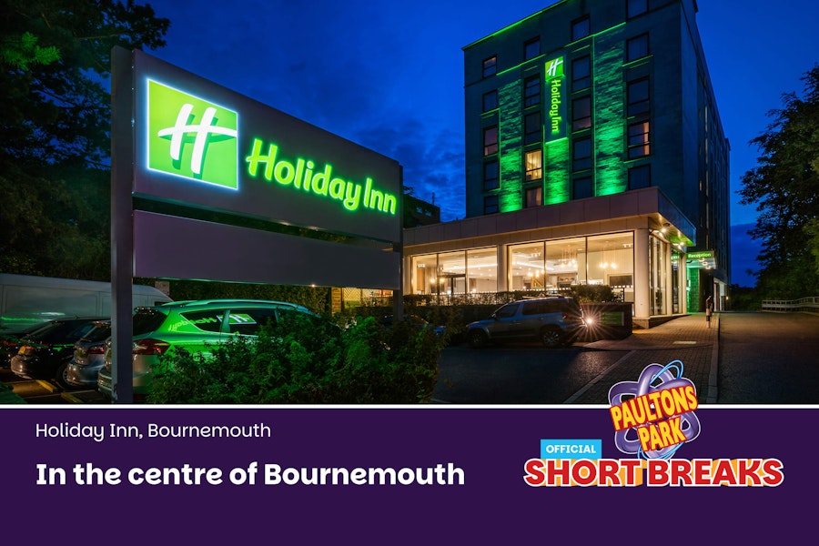 Bright hotel twin room with message highlighting central Bournemouth location.