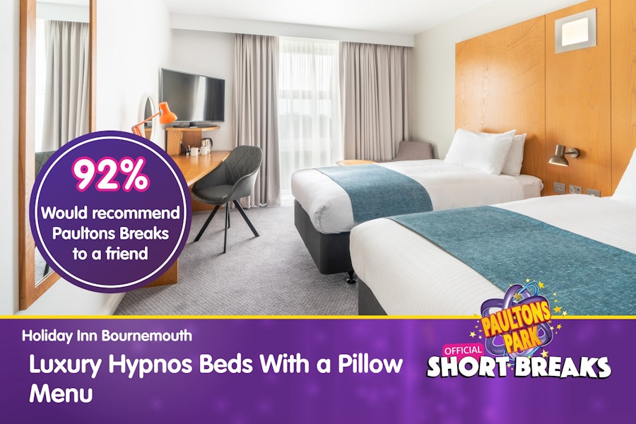 Modern twin room with caption promoting luxury Hypnos beds and pillow menu.