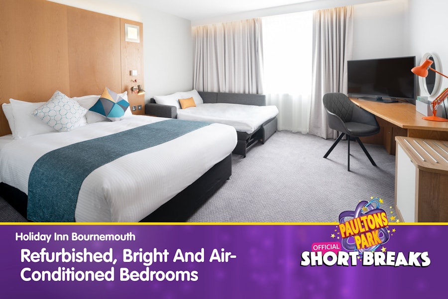 Family room with double and sofa bed, captioned as refurbished and air-conditioned."