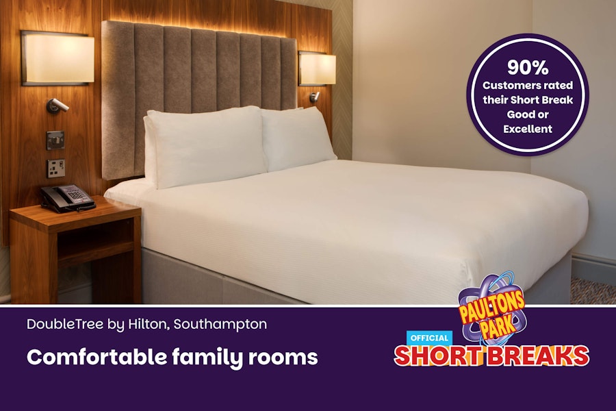 Hotel guestroom with twin beds - colour palette is soft neutral tones